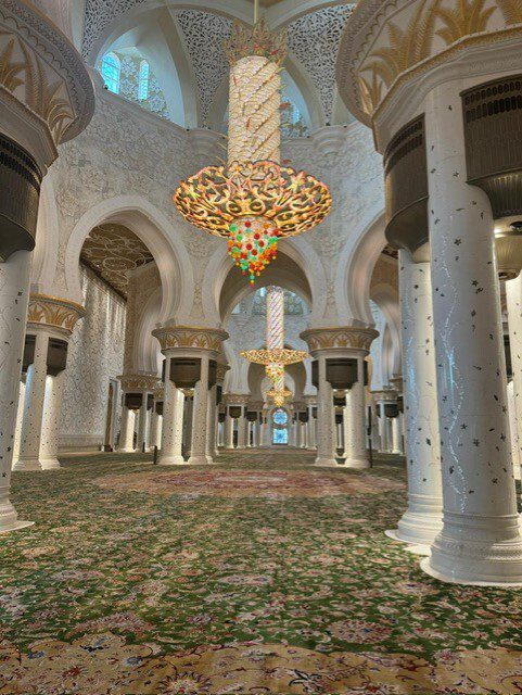 Inside mosque - Abu Dhabi with white interiors.